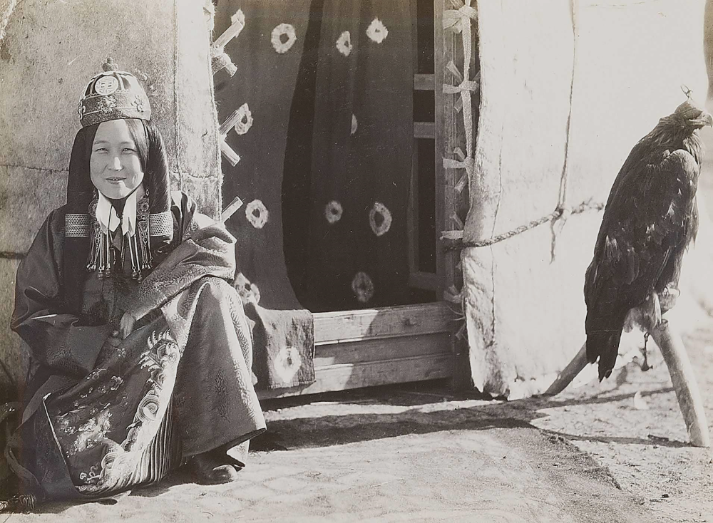 Photo of Princess Torghut Nirjidma and her eagle, Urumchi, China, 1932. Photo taken by Manyard Owen Williams for an article in The National Geographic Magazine.